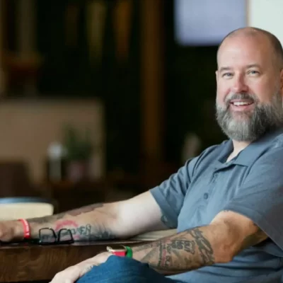 beatanxiety.me sitting on a chair.