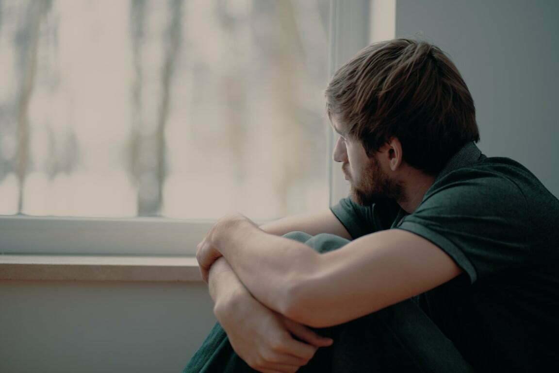 man alone sitting - Canton Georgia.